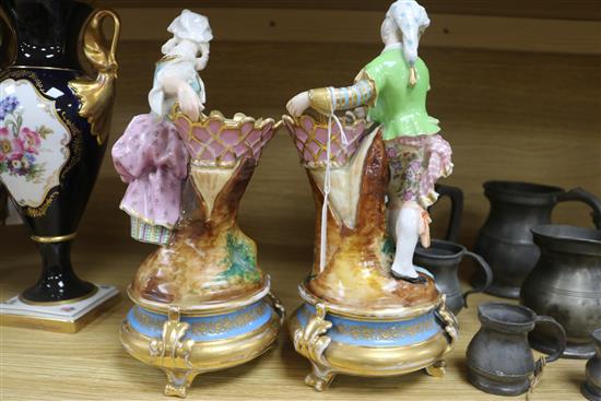 A pair of Paris porcelain figural bowls and a rolling pin